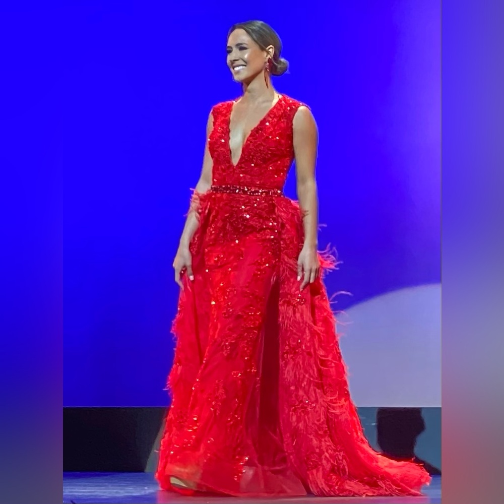 Red Colette for Mon Cheri gown with detachable feathered overskirt